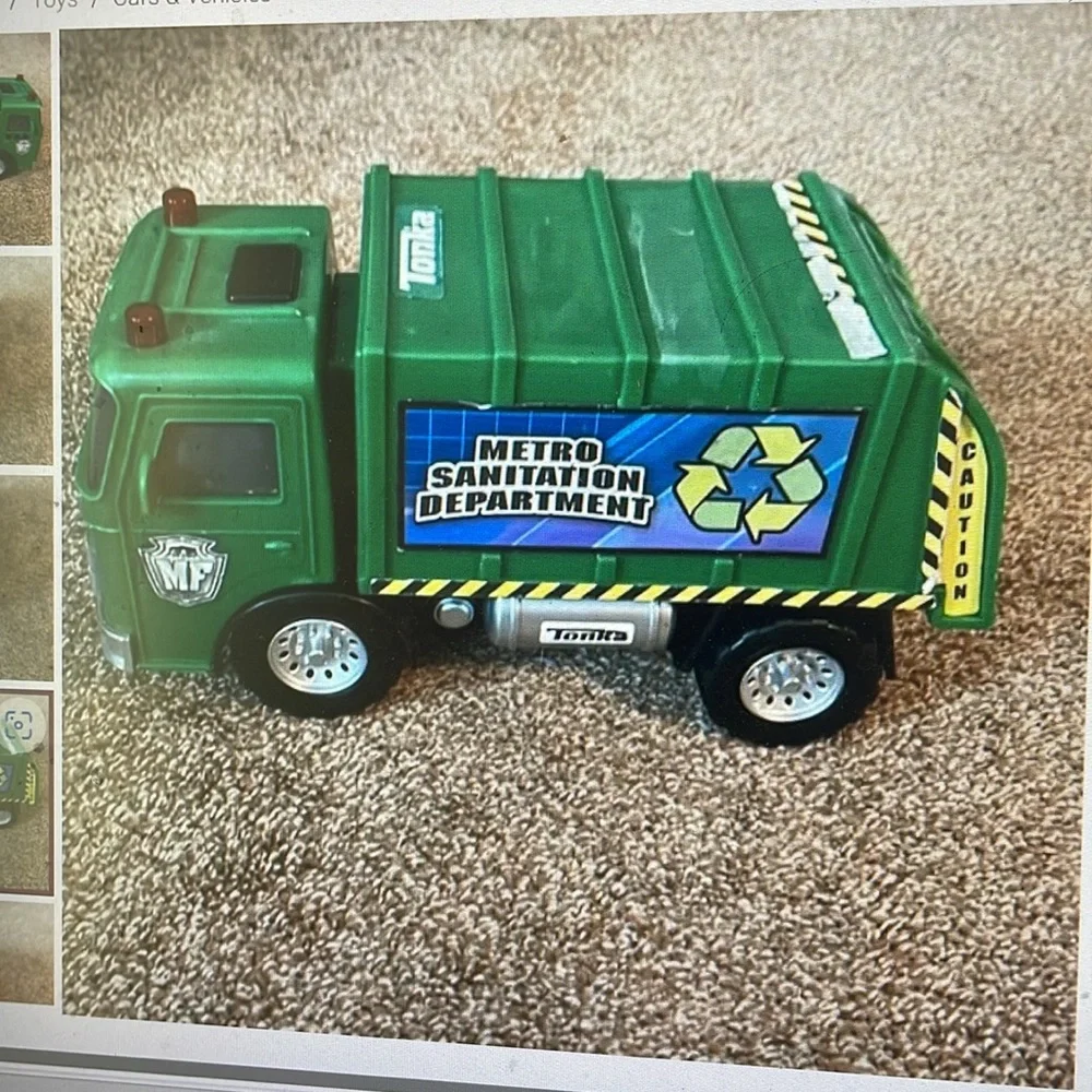 Tonka metro sanitation department green trash truck